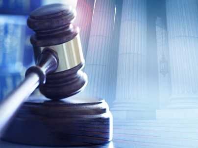 gavel with blue background