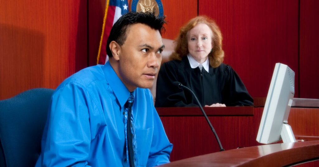 Man gives testimony in court.