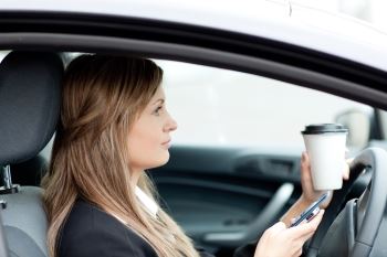 Person Driving With Phone