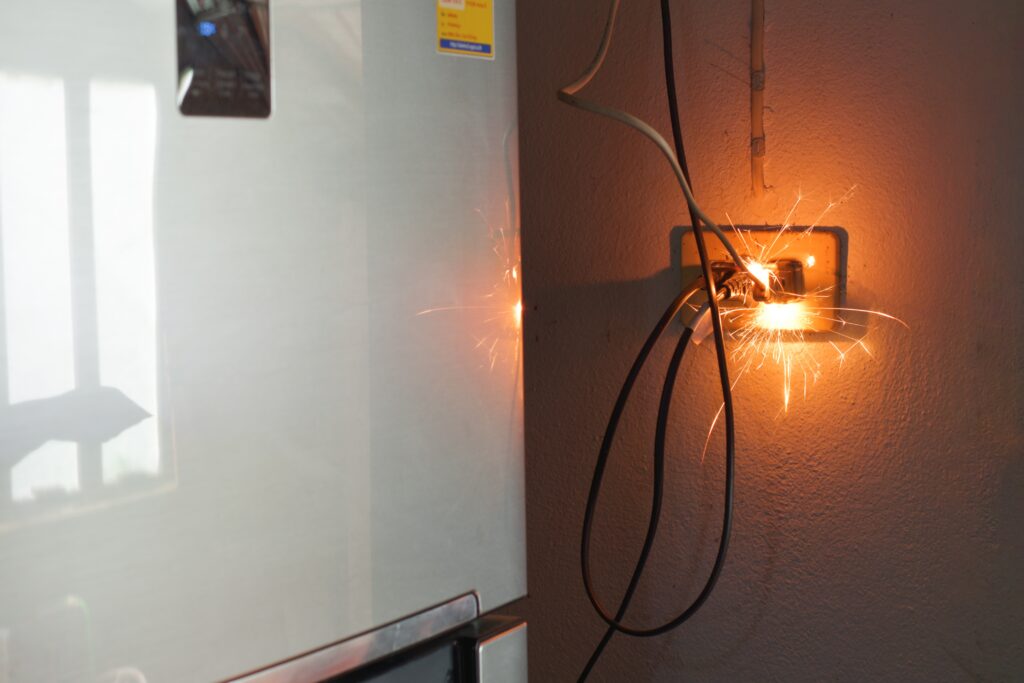 Electrical plug sparking and burning