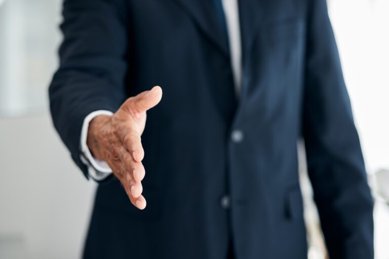 Handshake offer at a meeting
