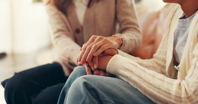 Holding hands, supporting loved one