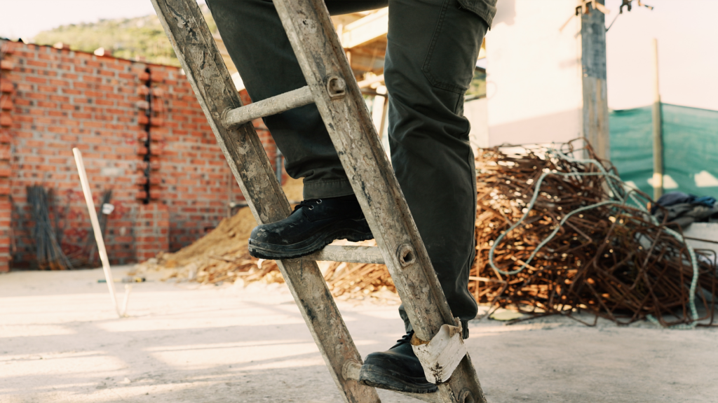 Person going up a ladder