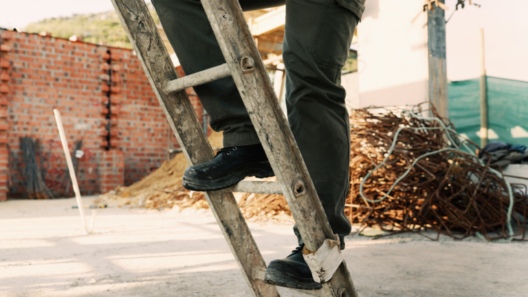 Person going up a ladder